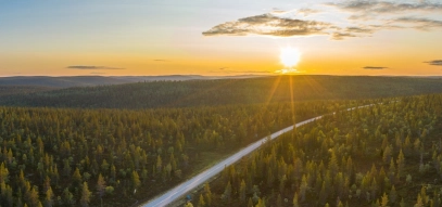 Elevated View, Road, Clear Sky, The Way Forward, Aerial View, Arctic, Beauty In Nature, Colour Image, Copy Space, Curve, Dramatic Sky, Drone Point of View, Dusk, Empty, Empty Road, Europe, Finland, Finnish Lapland, Forest, Freedom, High Up, Hill, Horizontal, Idyllic, Inari - Finland, Journey, Landscape - Scenery, Midnight Sun, Named Wilderness Area, Nature, No People, Non-Urban Scene, Outdoors, Photography, Remote Location, Rural Scene, Scenics - Nature, Sky, Summer, Sun, Sunbeam, Sunlight, Sunset, Travel Destinations, Wide Angle, Winding Road, Woodland,
